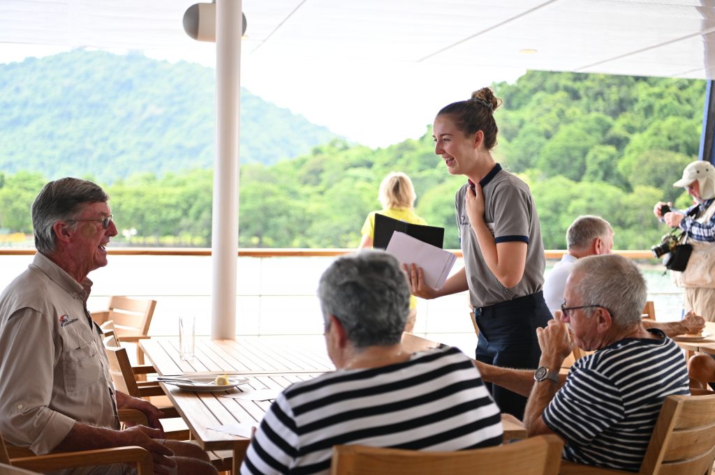 Midship on top-deck (Vista Deck) is located in our spacious Xplorer Bar is an outdoor bar lounge (large canopy-covered deck space) that provides the best panoramic views on the ship.